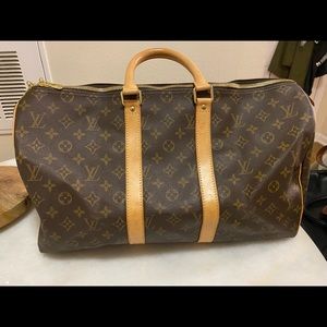 Authentic Louis Vuitton leather duffel! Used once!